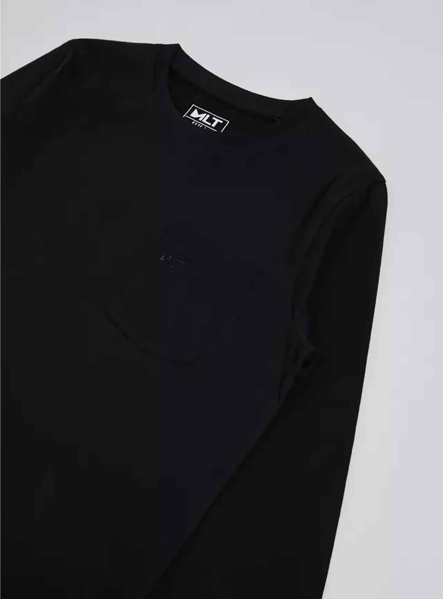 Polera Básica Color Sólido con Bolsillo Niño 3