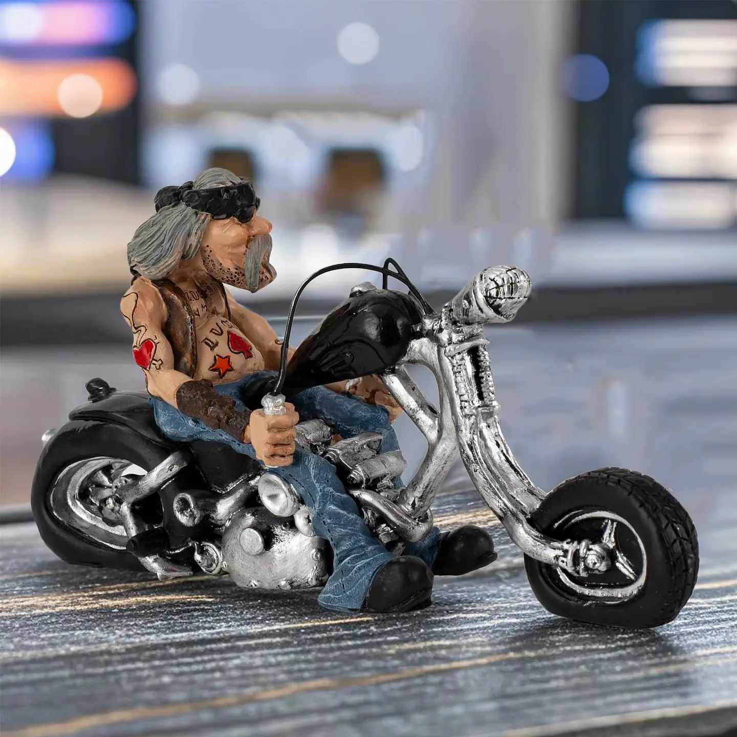 Estatuilla de Motoquero 