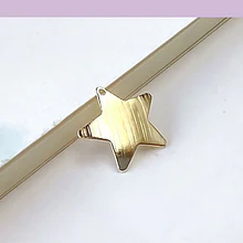 Dije baño de oro en forma de estrella, 17 mm de diámetro, por unidad