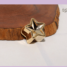 Separador baño de oro, en forma de estrella. 13 x 8 mm, agujero de 5 x 3 mm, por unidad