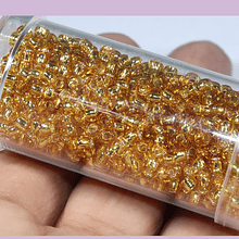 Mostacilla Calibrada 8/0 color dorado cristal, 20 grs.