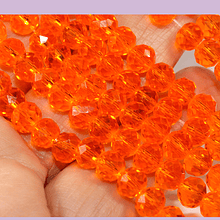 Cristal facetado en color naranjo transparente de 6 mm, tira de 90 cristales aprox