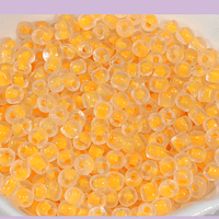 Mostacillón color naranjo, bolsa de 50 grs (6/0)