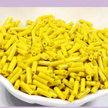 Canutillo color amarillo, 6 x 1,5 mm, set de 25 grs