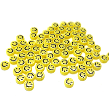 Separador caritas amarillo 7 mm, agujero de 1 mm, set de 10 grs. ( 80 piezas aprox)