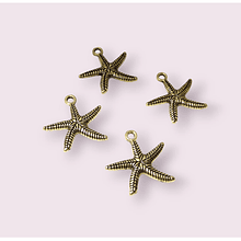 Dije estrella de mar dorado, 24 x 24 mm, set de 4 unidades