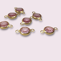 Dije acero dorado doble conexión, con cristal rosado facetado, 15 mm de largo x 9 mm de ancho, por unidades
