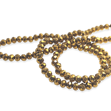 Cristal de 4 mm color dorado, tira de 120 cristales aprox