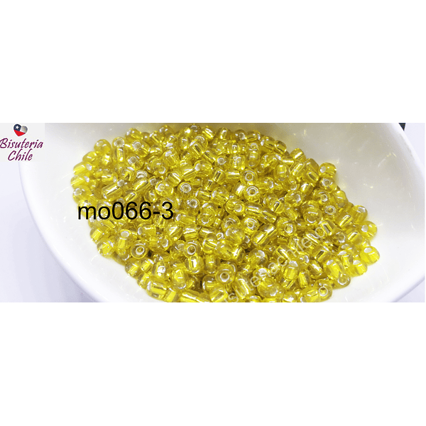 Mostacillon color amarillo cristal, bolsa de 50 grs. (6/0)