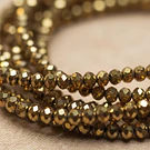 Cristal de 4 mm, color dorado tira de 128 cristales aprox.