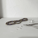 Cristal facetado de 6 mm, color multicolor metálico tornasol, tira de 85 cristales aprox.