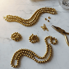 Cristal dorado de 6 mm, tira de 97 unidades