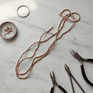 Cristal facetado 1.5 mm en color cobrizo metálico, 195 cristales aprox