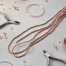 Cristal facetado 1.5 mm en color cobrizo metálico, 195 cristales aprox