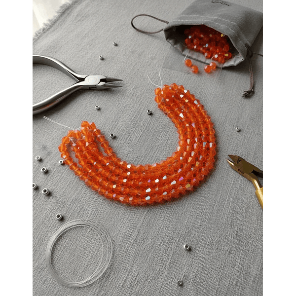 Cristal tupi 6 mm color naranjo tornasol de 45 cristales aprox