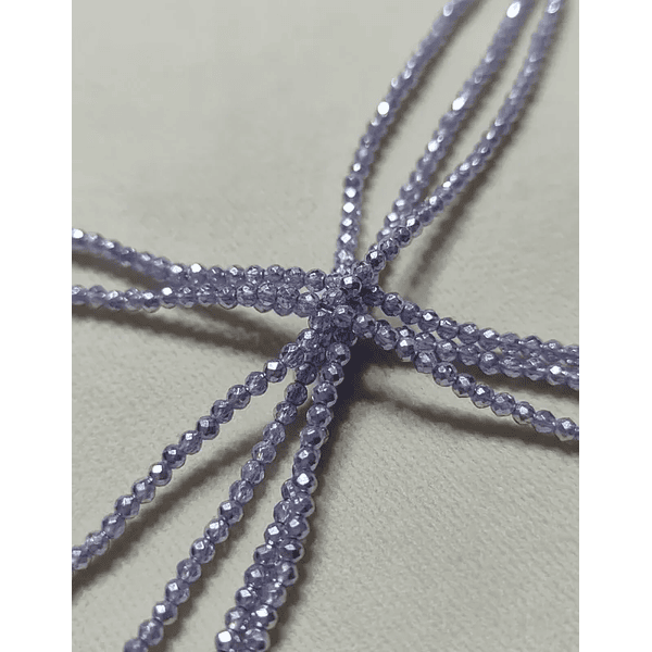 Cristal facetado 1.5 mm en color lila metalizado, 195 cristales aprox