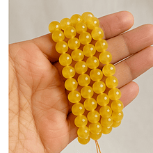 Agatas, Agata facetada en amarillo tonos azules de 8 mm, tira de 46 piedras apróx