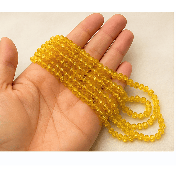 Cristal facetado de 6 mm, color AMARILLO CRISTAL, tira de 85 cristales aprox.