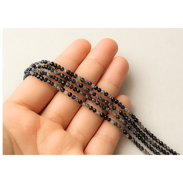 Piedras cuarzo turmalinado facetado de  2 mm, tira de 180 piedras aprox.