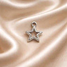Dije baño de plata en forma de estrella, 13 x 15 mm, por unidad