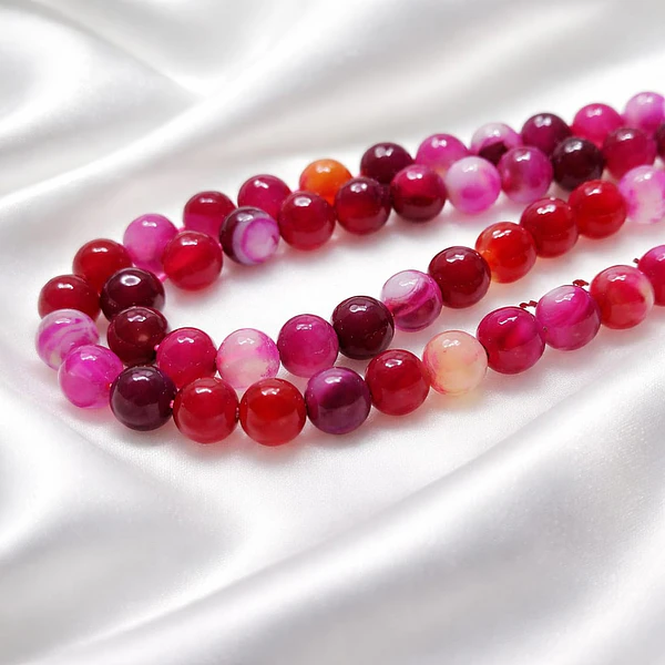 Agatas, Agata facetada en amarillo tonos fucsias y rosados de 8 mm, tira de 46 piedras apróx