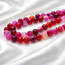 Agatas, Agata facetada en amarillo tonos fucsias y rosados de 8 mm, tira de 46 piedras apróx