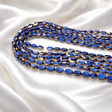 Cristal azul con aplicación, 7 x 4 mm, tira de 50 cristales aprox.