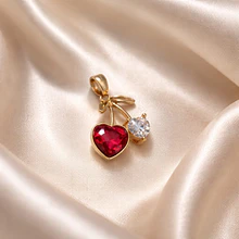 Colgante zirconita baño de oro, guinda, 19 x 16 mm, por unidad