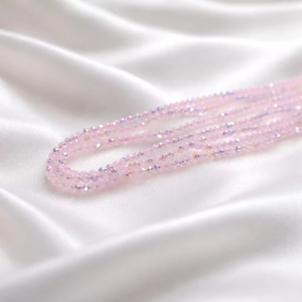 Cristal facetado 1.5 mm en color rosa con brillos, 195 cristales aprox