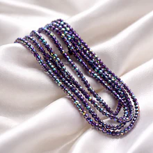 Cristal facetado 1.5 mm en color morado con brillos tornasol, 195 cristales aprox