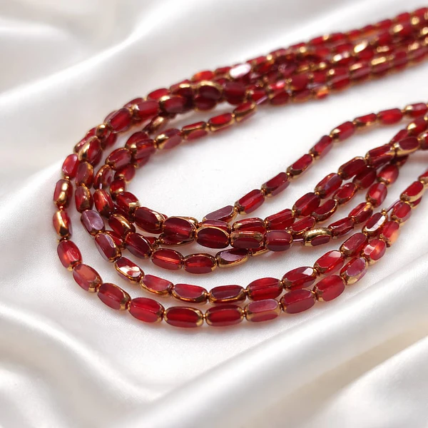 Cristal rojo con aplicación, 7 x 4 mm, tira de 50 cristales aprox