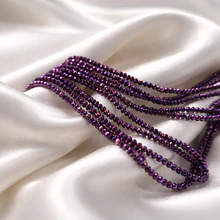 Cristal facetado 1.5 mm en color fucsia oscuro con brillos tornasol, 195 cristales aprox