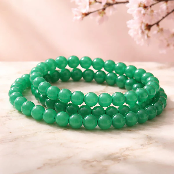 Perla de vidrio en color verde de 8 mm, tira de 53 unidades aprox.