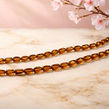 Cristal cafè con aplicación, 7 x 4 mm, tira de 50 cristales aprox