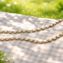 Cristal blanco con aplicación, 7 x 4 mm, tira de 50 cristales aprox