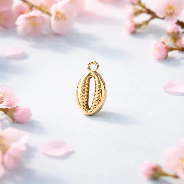 Dije conchita baño de oro, 17 x 9 mm, por unidad