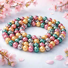 Perla Shell 8 mm, en tonos verde, coral y rosados, tira de 45 perlas aprox