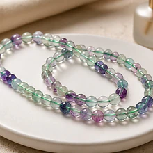 Fluorita lisa 6,5 mm, tira de 30 piedras