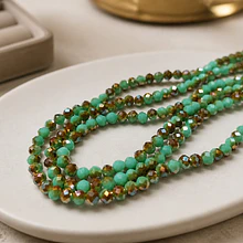 Cristal facetado de 4 mm verde claro y café, tira de 120 unidades aprox