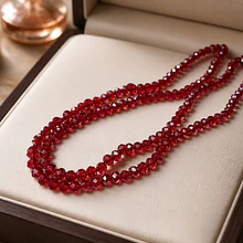 Cristal de 4 mm color rojo tornasol, tira de 120 cristales aprox