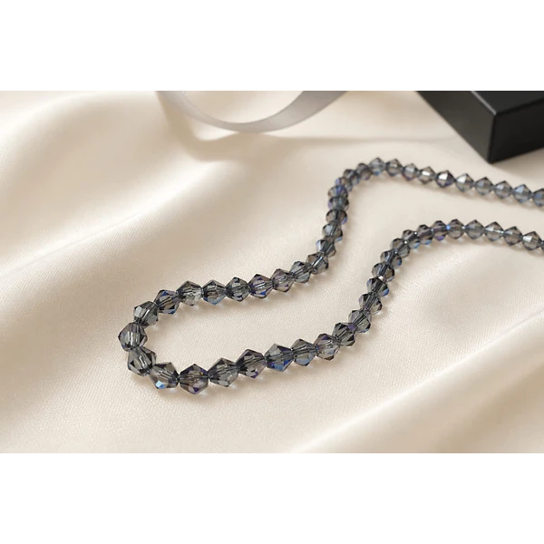Cristal tupi 6 mm gris tornasol, tira de 45 cristales aprox