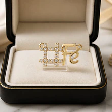 Colgante Fe, zirconia y baño de oro, doble conexión, 22 x 12 mm, por unidad