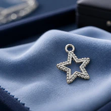 Dije baño de plata en forma de estrella, 13 x 15 mm, por unidad