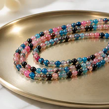 Agata de 4 mm en tonos celestes y rosados, tira de 92 piedras