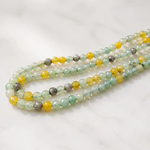Agata facetada de 4 mm, verdes, grises y amarillo,  tira de 92 aprox.