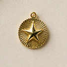 Colgante baño de oro con estrella, 24 mm de diámetro, 1 mm de grosor, por unidad
