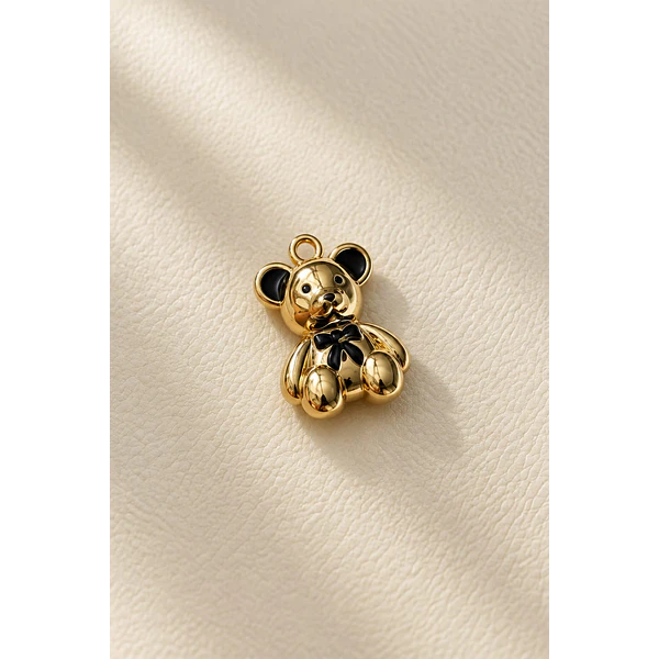 Colgante Oso, baño de oro, con esmaltado negro, 17 x 12 mm. por unidad