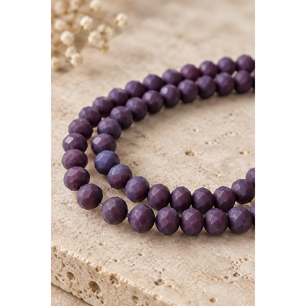 Cristal facetado en color morado de 6 mm, tira de 88 cristales aprox.