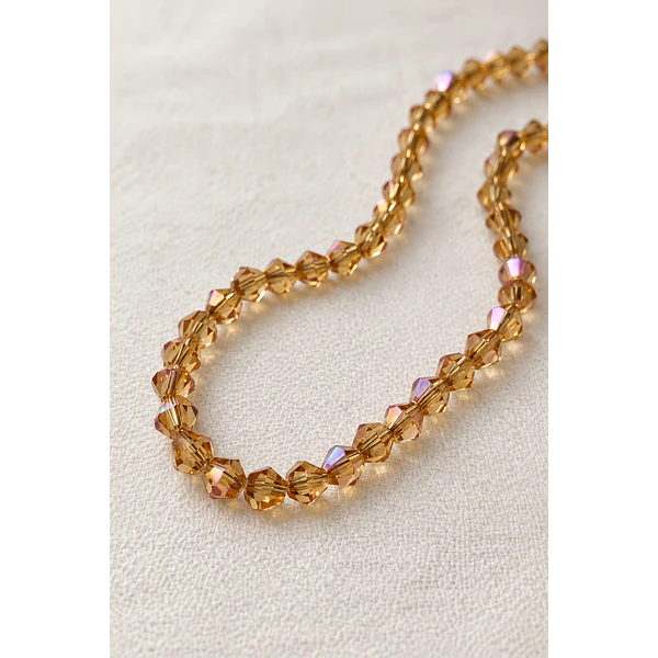 Cristal tupi 4 mm, color café claro tornasol, tira de 100 cristales aprox