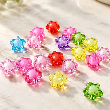 ACRILICOS MULTICOLOR EN ESTRELLA, 12 MM AGUJERO DE 2 MM, SET DE 20 GRS.